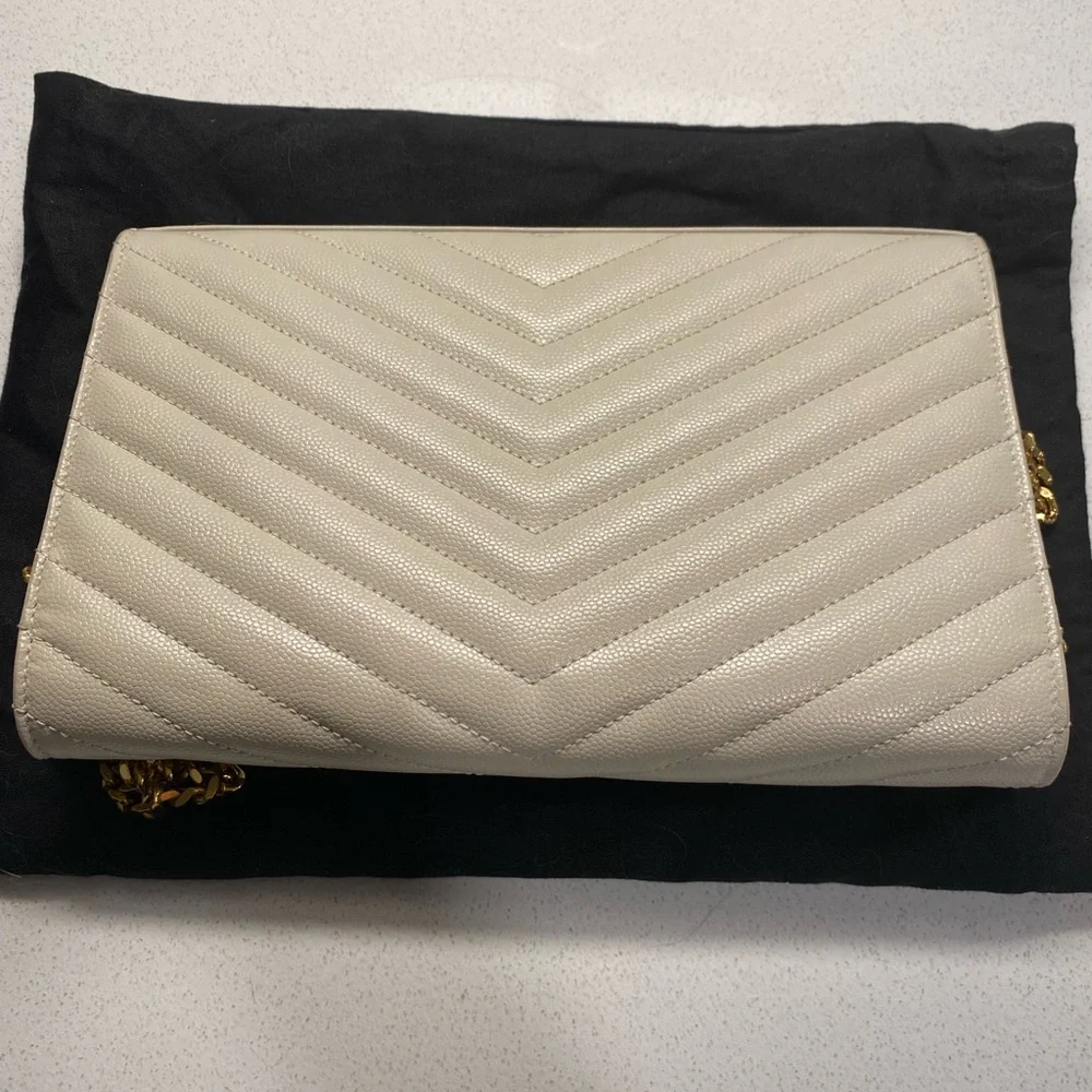 Yves Saint Laurent Ivory Quilted Crossbody with Gold Accents
Lightly used - Picture 4 of 6